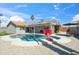 Private pool with a basketball hoop and lounge area perfect for outdoor relaxation at 10010 N 64Th Ave, Glendale, AZ 85302