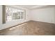 Inviting bedroom features tile floors, large window with views of the outside at 1014 W Hononegh Dr, Phoenix, AZ 85027