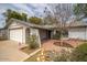 Cozy one-story home with well-kept landscaping, an attached garage, and a charming front entrance at 1014 W Hononegh Dr, Phoenix, AZ 85027