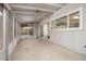 Enclosed patio featuring screens, ceiling fan, and access to backyard at 1014 W Hononegh Dr, Phoenix, AZ 85027