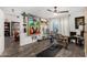 Bonus room with large painting, bike, workout mat and vintage chest at 1025 E Northern Ave, Phoenix, AZ 85020