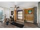 Bonus room featuring Murphy bed, ceiling fan, and plenty of natural light from the sliding glass door at 1025 E Northern Ave, Phoenix, AZ 85020