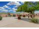 Charming common area featuring tables and seating, a pet waste station and manicured landscaping at 1025 E Northern Ave, Phoenix, AZ 85020