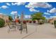 Inviting common area featuring tables and seating for relaxing and socializing outdoors at 1025 E Northern Ave, Phoenix, AZ 85020