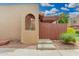 Inviting home exterior featuring a private entrance, wood accents, and desert landscaping at 1025 E Northern Ave, Phoenix, AZ 85020