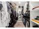 Spacious walk-in closet with custom shelving and ample storage for clothes and accessories at 1025 E Northern Ave, Phoenix, AZ 85020