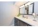 Bathroom featuring a modern vanity, stylish lighting, and sleek fixtures at 1216 E Ormondo Way, Phoenix, AZ 85014