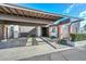 Attractive home exterior with covered parking and manicured landscaping at 1216 E Ormondo Way, Phoenix, AZ 85014