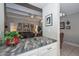 Kitchen counter that opens up to a spacious living room with lots of natural light at 1216 E Ormondo Way, Phoenix, AZ 85014
