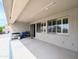 Covered patio with recessed lighting, multiple windows, and easy access to the backyard amenities at 14703 W Hillside St, Goodyear, AZ 85395