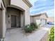 Inviting single-Gathering home with lush greenery, and well-maintained front yard at 14703 W Hillside St, Goodyear, AZ 85395