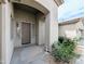 Inviting entryway with well-maintained landscaping adds to the curb appeal of this single Gathering home at 14703 W Hillside St, Goodyear, AZ 85395