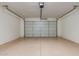 Spacious two car garage with painted floors at 16229 W Jenan Dr, Surprise, AZ 85379