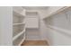 Walk-in Closet featuring shelves and hanging rods at 16229 W Jenan Dr, Surprise, AZ 85379