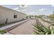 Side yard with a bocce ball court and desert landscaping at 17324 E Quail Track Rd, Rio Verde, AZ 85263