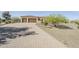 Stunning home featuring a paver driveway and three-car garage for ample parking space at 17324 E Quail Track Rd, Rio Verde, AZ 85263