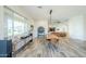 Great room showcases hardwood flooring, open layout to the living room, and ample natural light at 17324 E Quail Track Rd, Rio Verde, AZ 85263