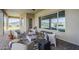 Covered patio area featuring outdoor seating with mountain views at 17324 E Quail Track Rd, Rio Verde, AZ 85263