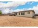 Extensive backyard space with a covered patio and plenty of room for customization and recreation at 18134 W Highland Ave, Goodyear, AZ 85395