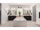 This primary bathroom features a standalone tub, dual vanities, and lots of natural light at 18134 W Highland Ave, Goodyear, AZ 85395