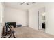 Large bedroom with neutral tones, plush carpet, and ensuite bathroom perfect for relaxation at 18134 W Highland Ave, Goodyear, AZ 85395