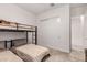 Comfortable bedroom showcasing a bunk bed and large closet for ample storage solutions at 18134 W Highland Ave, Goodyear, AZ 85395