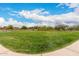Expansive community green space offers homeowners an area for relaxation and outdoor activities at 18134 W Highland Ave, Goodyear, AZ 85395