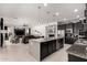 Open kitchen flows seamlessly into the living area, creating a perfect space for entertaining at 18134 W Highland Ave, Goodyear, AZ 85395