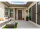 Inviting covered patio with comfortable seating and stylish decor at 18134 W Highland Ave, Goodyear, AZ 85395