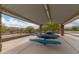 The covered picnic area with tables offers a pleasant outdoor spot for gatherings and meals at 18134 W Highland Ave, Goodyear, AZ 85395