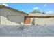 Exterior view of a single-story home with a two car garage and low maintenance desert landscaping at 18610 N Mica Dr, Sun City West, AZ 85375
