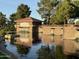 Stunning Cortina community entrance with decorative stone work and tranquil water features at 19203 S 185Th Dr, Queen Creek, AZ 85142