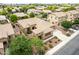 Stunning aerial view of a beautiful home with a well-maintained yard and a private pool in a friendly neighborhood at 1933 E Lafayette Ave, Gilbert, AZ 85298