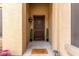 Inviting front porch with a welcoming 'Stay Awhile' door mat at 1933 E Lafayette Ave, Gilbert, AZ 85298