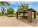 Picturesque park with a stone pavilion offering a picnic table for gatherings at 1933 E Lafayette Ave, Gilbert, AZ 85298