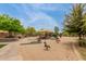Inviting neighborhood playground with slides, swings, and playful spring riders at 1933 E Lafayette Ave, Gilbert, AZ 85298