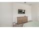 Neutral bedroom with dresser, TV, carpeted floor, and great natural light at 19742 W Harrison St, Buckeye, AZ 85326