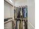 Walk-in closet with upper shelving and hanging racks at 19742 W Harrison St, Buckeye, AZ 85326
