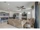 Comfortable living room with an open layout, great for entertaining, and easy access to the kitchen at 19742 W Harrison St, Buckeye, AZ 85326
