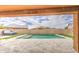 Backyard pool with hot tub and a clear view of the sunny sky at 19742 W Harrison St, Buckeye, AZ 85326