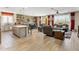 Spacious open-concept living area that connects to the kitchen and dining area, great for entertaining at 20181 N Lauren Rd, Maricopa, AZ 85138