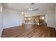 Open-concept loft with wood-look floors and staircase at 21549 N Backus Dr, Maricopa, AZ 85138