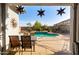 Covered patio and pool area provide a perfect view, with a comfortable seating area and inviting ambiance at 21963 W Tonto St, Buckeye, AZ 85326
