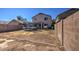 Large backyard, perfect for outdoor activities and entertaining, enclosed by brick walls at 22741 N Scott Dr, Maricopa, AZ 85138