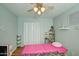 Versatile bedroom space with a ceiling fan that can be used as a home office or a tranquil massage room at 22741 N Scott Dr, Maricopa, AZ 85138