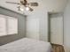 Well-lit bedroom featuring a ceiling fan, closet, and window for lots of light at 22741 N Scott Dr, Maricopa, AZ 85138
