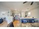 Modern kitchen featuring stainless steel appliances, ample counter space, and a convenient breakfast bar at 22741 N Scott Dr, Maricopa, AZ 85138