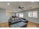 Cozy living room with a comfortable sectional sofa and an open layout at 22741 N Scott Dr, Maricopa, AZ 85138