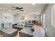 Spacious living room with modern furniture and hardwood flooring at 22741 N Scott Dr, Maricopa, AZ 85138