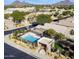 Aerial view of the community pool, surrounded by lush landscaping and well-maintained homes at 23046 N 88Th Way, Scottsdale, AZ 85255